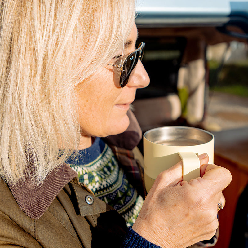 12oz-rise-mug-c8 12oz_rise_coffee_mug_wax_yellow_woman_drink_closeup_square.jpg