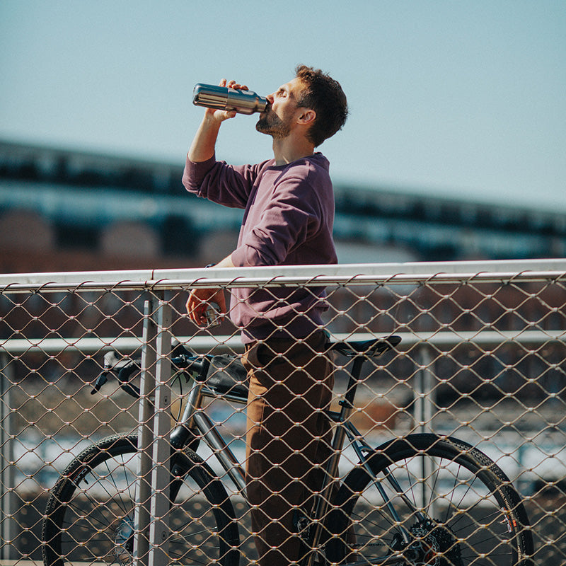 20oz-rise-reflect-with-bamboo-cap-e4 16oz_rise_reflect_man_bike_square.jpg