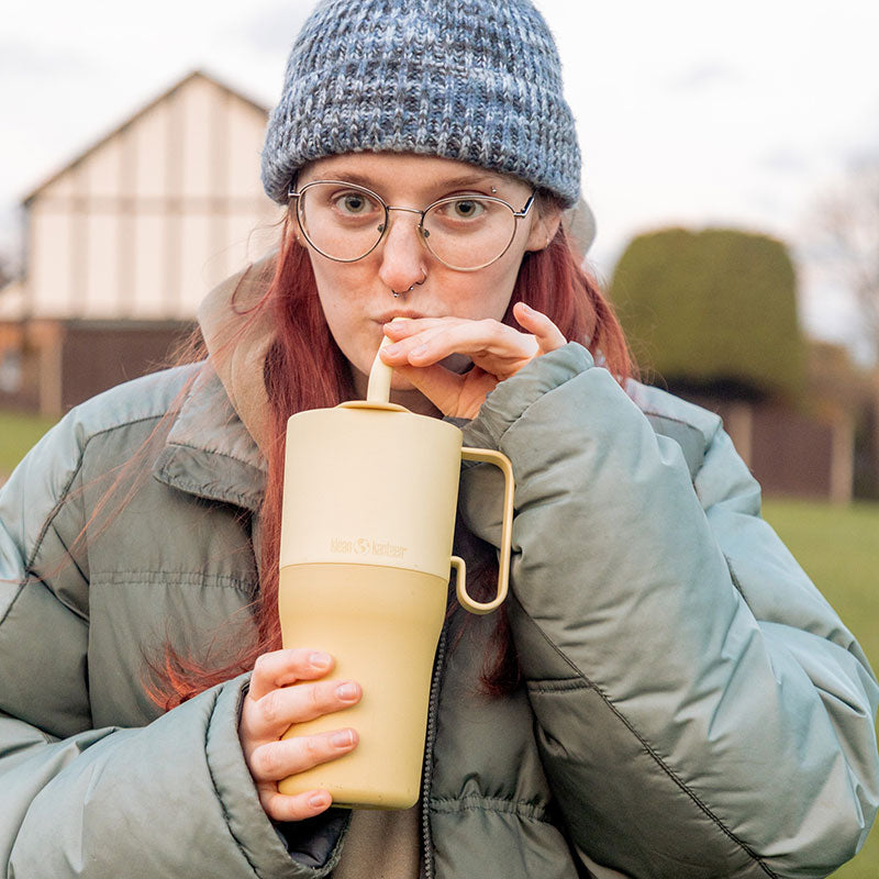 26oz-rise-tumbler-with-straw-lid-b8 26oz_rise_rumbler_straw_wax_yellow_woman_sip_square.jpg