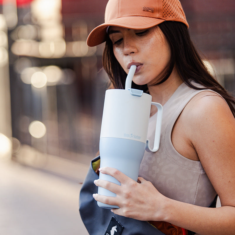 36oz-rise-tumbler-with-straw-lid-o9 36oz_rise_tumbler_straw_girl_sip_square.jpg