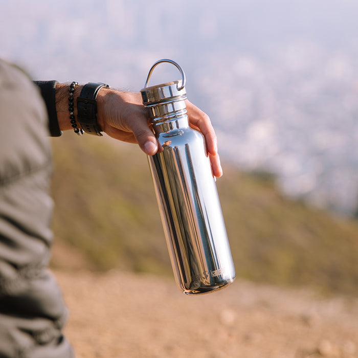 27oz-reflect-with-bamboo-cap-g4 K27SSLRF-MS-BAMBOO_reflect_bottle_hand_lifestyle.jpg
