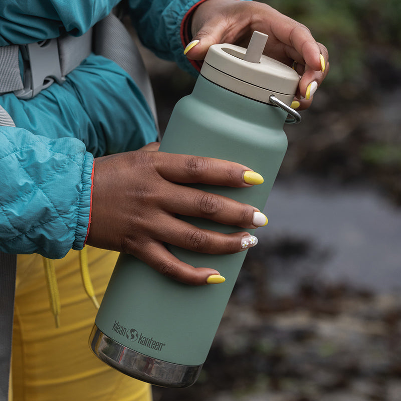 32oz-tkwide-made-to-do-more-bundle-m0 tkwide_32oz_insulated_bottle_twist_closeup_seapsray_hand_square.jpg