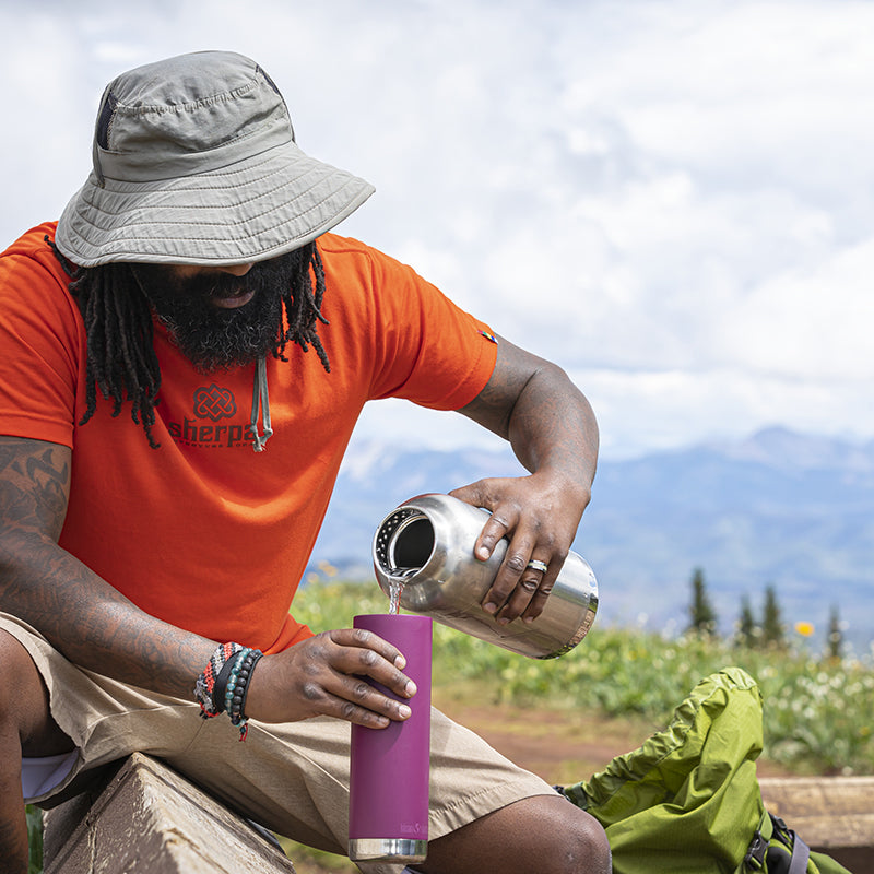 64oz-tkwide-with-loop-cap-b2 tkwide_64oz_bottle_backpacker_mountains_filling_square.jpg