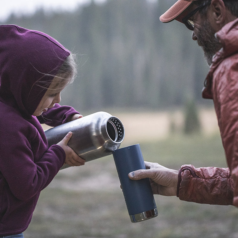 64oz-tkwide-with-loop-cap-b2 tkwide_64oz_bottle_girl_dad_filling_square.jpg